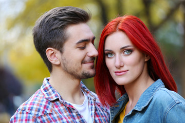 Fototapeta premium Loving couple in autumn park