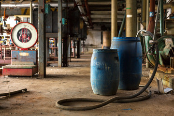 Industrial interior with chemical tanks