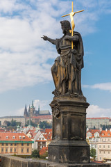 Jesus Christ statue on the Charles Bridge in Prague (Czech Repub