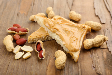 Slices of bread with creamy peanut butter