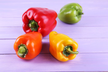 Pepper on wooden background