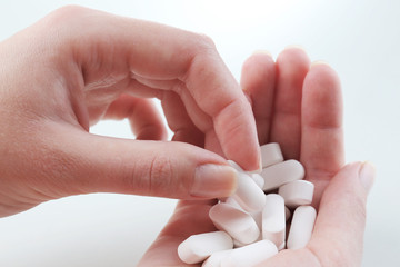 Pills in hand, close-up