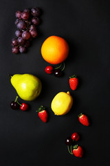 Fruits on black background