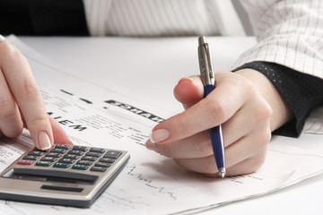 Business woman working with tax documents