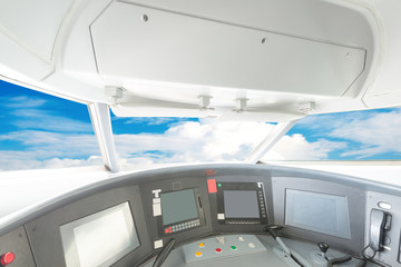 plane cockpit and cloudy sky