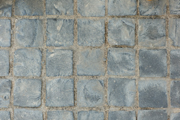 Texture of exposed cement floor tiled.