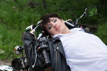 Stylish girl on a bike