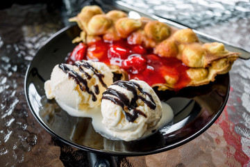 waffles with ice cream, chocolate sauce