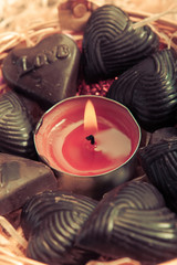 candle around chocolates - retro style