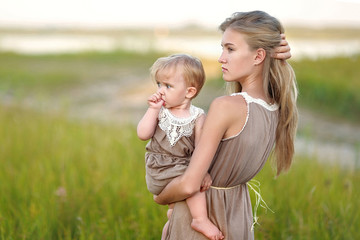 Fototapeta premium portrait of two sisters in nature summer