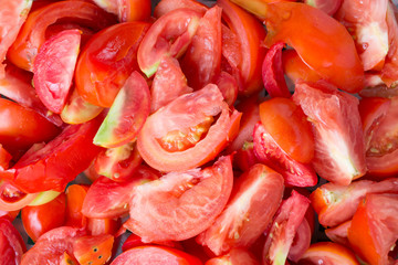 heap of sliced red tomatoes freshness