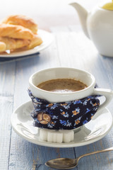 coffee cup black wooden board brown white jug milk croissants