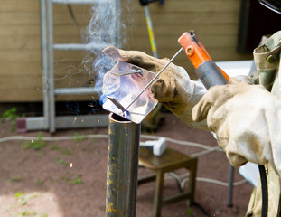 Welder, repairing the gardening equipment