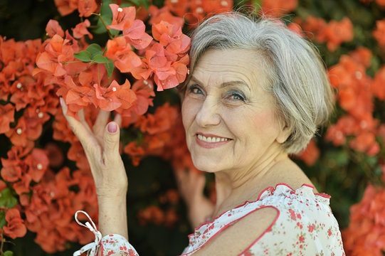 Woman With Red Flowers