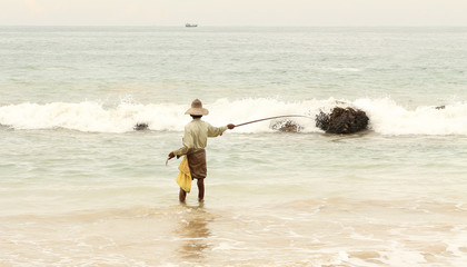 Fototapeta na wymiar indian fisherman with rod