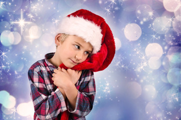 Kind als Weihnachtsmann