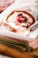 Swiss roll dessert with raspberries