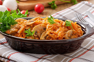 Stewed cabbage with mushrooms and tomato sauce
