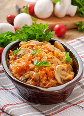 Stewed cabbage with mushrooms and tomato sauce