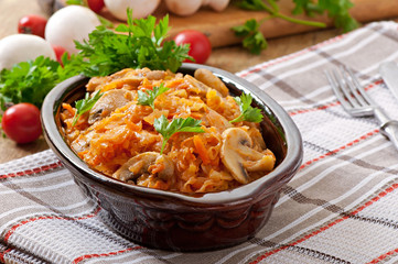 Stewed cabbage with mushrooms and tomato sauce