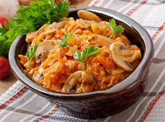 Stewed cabbage with mushrooms and tomato sauce