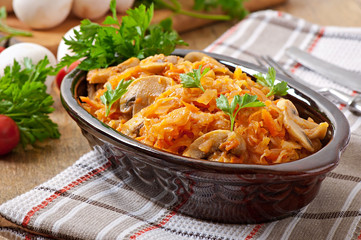 Stewed cabbage with mushrooms and tomato sauce