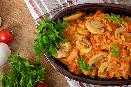 Stewed cabbage with mushrooms and tomato sauce