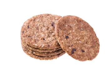 Several oatmeal cookies in a stack. On a white background.