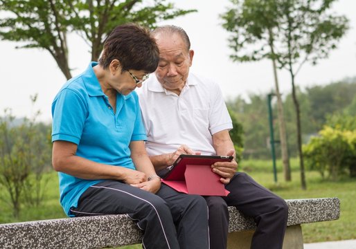 Senior Couple On Computer Tablet