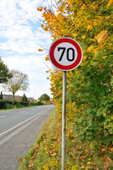 Speed limit road sign of 70 kilometres per hour