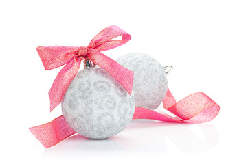 Christmas baubles and red ribbon