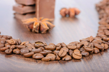 Coffee beans close up and chocolate