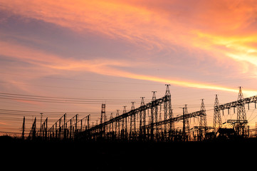 Sunset over an electrical substation