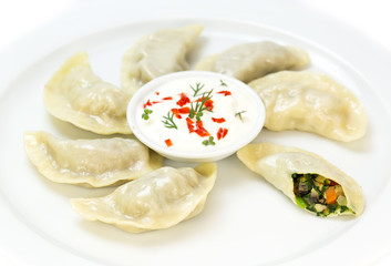 Nepalese food momo on a white background in the restaurant