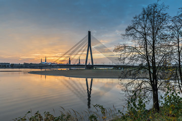 Fototapeta na wymiar Morning view on cable-bridge and old Riga city