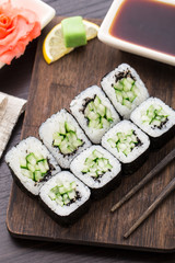 Sushi rolls with cucumber and sesame seed
