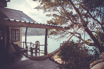 Fototapeta na wymiar Romantic hammock in private house near the tropical beach