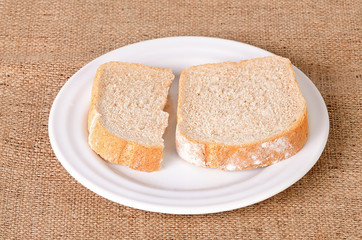 Sliced bread on plate