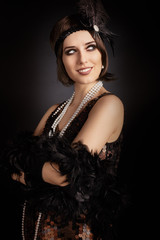 Beautiful retro woman from the roaring 20s ready to party