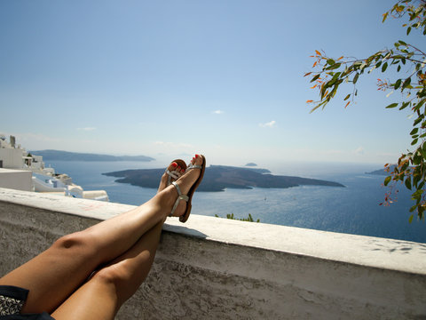 Woman relaxing in Santorini, Greece