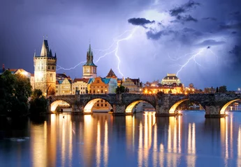 Tuinposter Prague bridge at storm © TTstudio