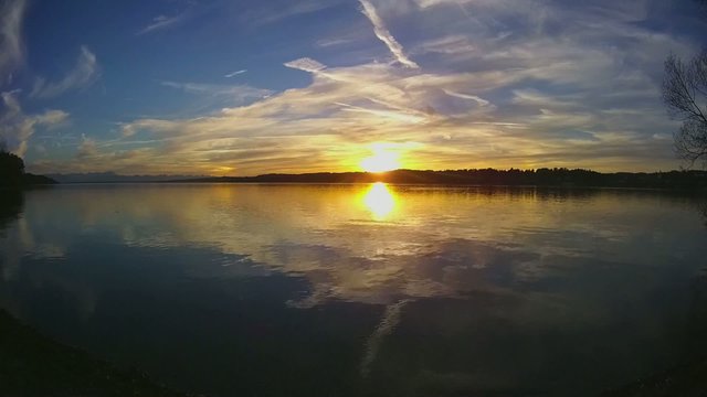 Sunset with swans on Lake Starnberg, Germany, time lapse
