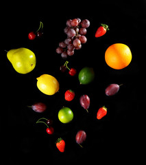 Fruits on black background