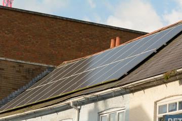 Fototapeta premium Solar panels on building roof