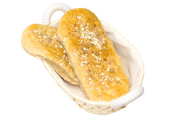 Basket with bread isolated on white
