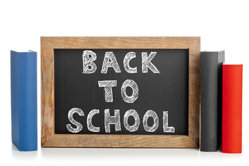 Back to school chalkboard  with books