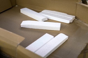 Opened cardboard box in a building