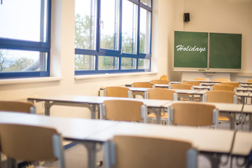 empty classroom with holidays letters