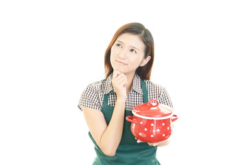 困った表情の主婦