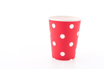 Red polka dot paper cup isolated on white background